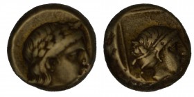 Lesbos, Mytilene EL Hekte. Circa 375-325 BC. Laureate head of Apollo right / Head of Artemis right, hair bound in sphendone, serpent behind; all withi...