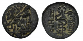 Mysia, Pergamon Æ14. c. 133-27. 
Laureate head of Asklepios r. / Serpent-entwined staff of Asklepios. SNG BnF 1828-1848. Condition: Very Good 2.5 gr. ...