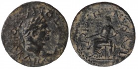 PHRYGIA. Prymnessos. Titus (79-81). 
Ae. Obv: TI AYTOKPATOPA KAICAP. Laureate head right. Rev: ?PYMNHCCIC. Dikaiosyne seated left, holding scales, cor...