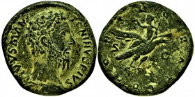 Divus Marcus Aurelius Æ Sestertius. Rome, AD 180. DIVVS M ANTONINVS PIVS, bare head right / [C]O[NSECRA]TIO, eagle flying right, bearing aloft Marcus ...