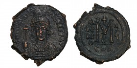 Mauritius Tiberius. Follis. Constantinople mint, 3rd officina. 
Æ Crowned and cuirassed facing bust, holding globus cruciger and shield / Large M; cro...