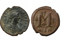 Justin I and Justinian I Æ Follis. Nicomedia, AD 527. Diademed, draped, and cuirassed bust of Justin right / Large M; cross above, star and cross flan...