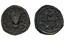MAURICE TIBERIUS (582-602). Follis. Kyzikos. 
Obv: D N mAVRICI TIbER P P AVC. 
Helmeted and cuirassed bust facing, holding globus cruciger and shield....