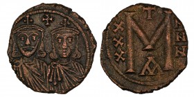 Byzantine Michael II Amorianus (820 - 829 AD) and Theophilus.
Follis AD 820 - 829 Constantinopolis.
Vs: Crowned busts of Michael II in Chlamys and The...