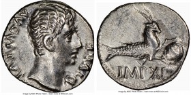 Augustus (27 BC-AD 14). AR denarius (18mm, 3.64 gm, 5h). NGC AU 5/5 - 2/5. Lugdunum, 12 BC. AVGVSTVS-DIVI F, bare head of Augustus right / Capricorn r...