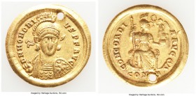 Honorius, Western Roman Empire (AD 393-423). AV solidus (21mm, 4.41 gm, 6h). VF, holed. Constantinople, 4th officina, ca. AD 397-402. D N HONORI-VS P ...