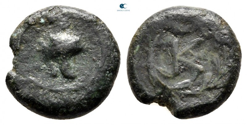 Sicily. Tauromenion circa 392-358 BC. 
Bronze Æ

13 mm., 2,21 g.



nearl...