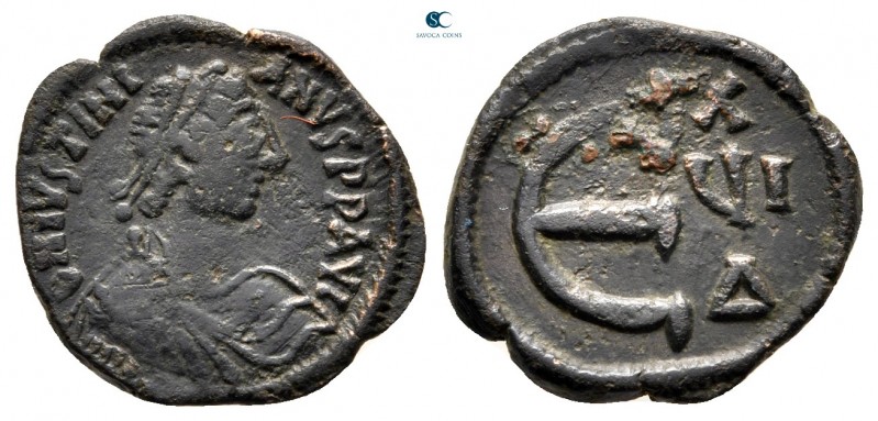 Justinian I AD 527-565. Dated year 16=AD 542/3. Uncertain mint
Pentanummium Æ
...