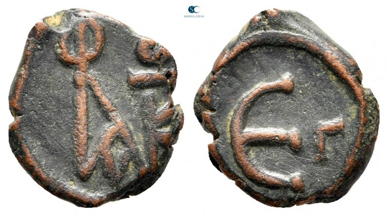 Justin II AD 565-578. Constantinople
Pentanummium Æ

15 mm., 1,92 g.



v...