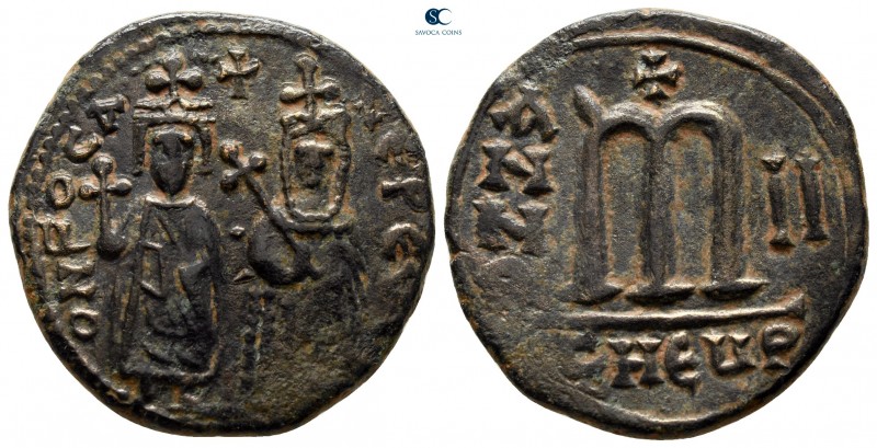 Phocas, with Leontia AD 602-610. Theoupolis (Antioch)
Follis Æ

25 mm., 8,44 ...