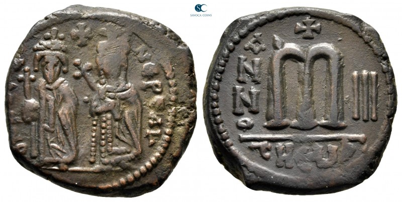 Phocas, with Leontia AD 602-610. Theoupolis (Antioch)
Follis Æ

27 mm., 11,03...