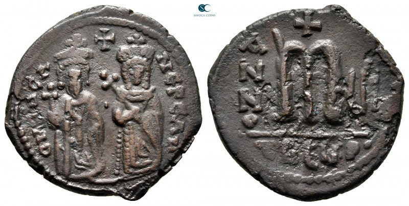 Phocas, with Leontia AD 602-610. Theoupolis (Antioch)
Follis Æ

28 mm., 8,51 ...