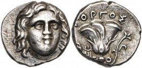 ILES DE CARIE, RHODES, ville de Rhodes, AR drachme, 205-188 av. J.-C. D/ T. r. d''Hélios de f., légèrement tournée vers la d. R/ ΓOPΓΟΣ Rose avec bout...