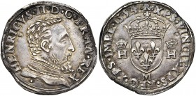 FRANCE, Royaume, Henri II (1547-1559), AR teston, 1554M, Toulouse. 2e type. D/ B. cuir. à d., t. nue. R/ Ecu de France couronné, entre deux H couronné...
