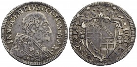 BOLOGNA - Innocenzo XI (1676-1689) - Testone - 1683 - Busto a d. - R/ Stemma a targa semiovale, due figure sedute sulla cimasa - (AG g. 9,12) RR CNI 3...