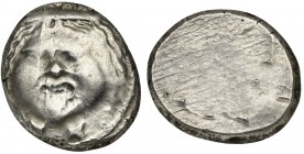 Etruria, Populonia, 20 Units, 3rd century BC. AR (g 8,65; mm 22,5; h 12). Gorgoneion; below, X:X, Rv. poplu (?). HNItaly 152; Vecchi XII.37, n. 197 (t...