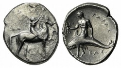 Southern Apulia, Tarentum, Nomos, ca. 302-280 BC. AR (g 7,63; mm 21; h 12). Youth on horseback r., crowning horse; ΣA to l., APE/ΘΩN in two lines belo...
