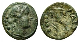 Northern Lucania, Paestum, Triens, 218-201 BC. AE (g 3,10; mm 16; h 9). Female head r. wearing ivy wreath; four pellets to l.; Rv. ΠAIS, Cornucopia; f...