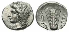 Southern Lucania, Metapontion, Stater, ca. 330-290 BC. AR (g 7,84; mm 21; h 6). Wreathed head of Demeter l.; Rv. META, Barley ear, leaf to l.; tongs a...