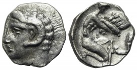 Southern Lucania, Metapontion, Diobol, ca. 325-275 BC. AR (g 0,79; mm 10; h 3). Head of Apollo Karneios l.; Rv. Herakles kneeling r., fighting lion; c...
