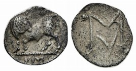 Southern Lucania, Sybaris, Obol, ca. 550-510 BC; AR (g 0,44; mm 9; h 1). Bull standing l., head r.; VM in exergue; Rv. Large MV monogram; pellets at c...