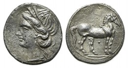 Bruttium, Carthaginian occupation, Quarter Shekel, ca. 216-211 BC. AR (g 1,84; mm 14,5; h 12). Wreathed head of Tanit-Demeter l.; Rv. Horse standing r...