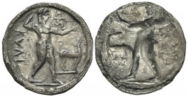 Bruttium, Kaulonia, Stater, ca. 525-500 BC; AR (g 7.69; mm 29; h 12); KAVL (retrograde), Apollo advancing r., holding branch; small daimon running r. ...
