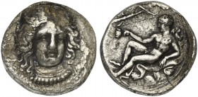 Bruttium, Kroton, Stater, ca. 400-325 BC. AR (g 7,20; mm 20; h 9). Head of Hera Lakinia facing, wearing stephane; on r., KPOTO, Rv. Heracles seated l....