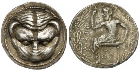 Bruttium, Rhegion, Tetradrachm, ca. 445-435 BC. AR (g 16,92; mm 27; h 3). Facing lion's head, Rv. RECIИ-OS (S retrograde), Iokastos seated l., holding...