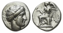 Bruttium, Terina, Stater, ca. 420-400 BC; AR (g 7,04; mm 18,5; h 6). Head of the nymph Terina r.; Rv. Nike seated l. on plinth, holding out r. hand up...