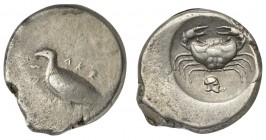 Sicily, Akragas, Didrachm, ca. 488/485 - 480/478 BC. AR (g 8,73; mm 22; h 9). AKR - ACAΣ, eagle standing l., Rv. crab; below helmt to r.; all within i...