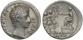 Augustus (27 BC-AD 14), Denarius, Lugdunum, 15 BC. AR (g 3,77; mm 19; h 6). AVGVSTVS DIVI F, Bare head r., Rv. Augustus seated l. on curule chair set ...
