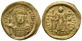 Justinian I (527-565); AV Solidus (g 4,48; mm 21; h 6); Constantinople, 538-545; Helmeted and cuirassed bust facing, holding globus cruciger and shiel...