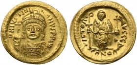Justinian I (527-565); AV Solidus (g 4,52; mm 21; h 6); Constantinople, 545-565; Helmeted and cuirassed bust facing, holding globus cruciger and shiel...