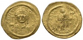 Justinian I (527-565); AV Solidus (g 4,41; mm 20,5; h 6); Constantinople, 545-565; Helmeted and cuirassed bust facing, holding globus cruciger and shi...