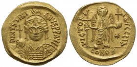 Justinian I (527-565); AV Solidus (g 4,45; mm 21; h 6); Carthage, year 11 (AD 547/8); Helmeted and cuirassed bust facing, holding globus cruciger and ...