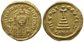 Tiberius II (578-582); AV Solidus (g 4,45; mm 21; h 6); Constantinople. Crowned and cuirassed bust facing, holding globus cruciger and shield; Rv. Cro...