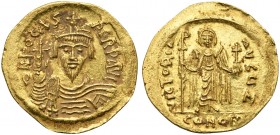 Phocas (602-610); AV Solidus (g 4,50; mm 22; h 6); Constantinople, 607-610; Crowned, draped and cuirassed bust facing, holding globus cruciger; Rv. An...