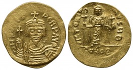 Phocas (602-610); AV Solidus (g 4,49; mm 21; h 6); Constantinople, 607-9. Crowned, draped and cuirassed facing bust, holding cross; Rv. Angel standing...