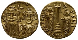 Constans II (641-668); AV Solidus (g 3,98; mm 18; h 6); Constantinople, 662-667. Draped facing busts of Constans II, wearing plumed helmet, and Consta...