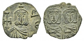 Constantine V (741-775); AE 40 Nummi (g 2,41; mm 18; h 6). Syracuse, 757-775. Crowned facing busts of Constantine and Leo IV, each wearing chlamys and...
