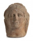 Italic Terracotta Portrait, 4th - 3rd century BC; height cm 25; Characterized by fleshy lips and almond-shaped eyes; the hair are rendering in short a...