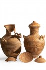 Couple of Greek Geometric Amphorae, 8th century BC; height max (with lid) cm 43, height max cm 39, diam. cm 14. Provenance: Collection returned by the...