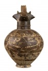 Corinthian Trefoil Oinochoe with Typhon, 600 - 550 BC; height cm 42; Large trefoil oinochoe, with double small wheels. The decoration is arranged in t...