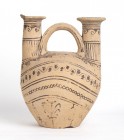 Big Messapian Double Spouted Askos, 4th - 3rd century BC; height cm 27. Provenance: Private collection, London; acquired on the European art market in...