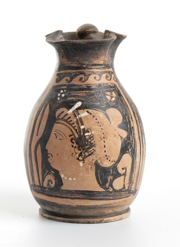 Apulian Red-Figure Oinochoe, 4th century BC; height cm 14,5; With a female head ...