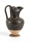 Apulian Black-Glazed Trefoil Oinochoe, 4th - 3rd century BC; height cm 18; Intact. Provenance: English private collection, according to the heirs poss...