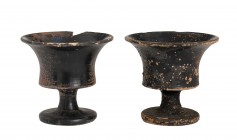 Couple of Apulian Black-Glazed Chalices, 4th - 3rd century BC; height max cm 8, diam. max cm 9. Provenance: English private collection, according to t...