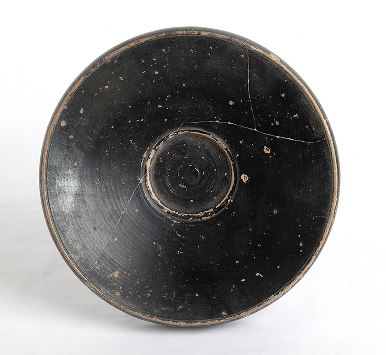 Apulian Black-Glazed Fish Plate, 4th - 3rd century BC; height cm 6, diam. cm 26....