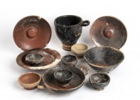 Group of Twelve Etruscan, Apulian and Campanian Black-Glazed Vessels, 4th - 3rd century BC; height max cm 14, diam. max cm 19. Provenance: English pri...